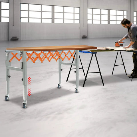 Adjustable Roller Conveyor Heavy Duty Material Handling Gear For Warehouse Packaging Lines Flexible Gravity Conveyor System in use with carpenter.
