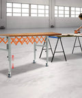 Heavy Duty Adjustable Conveyor Roller Table With Universal Wheels For Moving Wood And Construction Materials Up To 110lbs Loading Capacity and solid iron build.