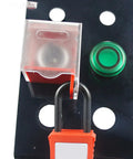 Emergency Stop Button Lockout Cover For Push Button Switches No Nonsense Guard Made From Polycarbonate Engineering Plastic Durable Shield To Prevent Accidental Operation Compatible With Various Switches In Industrial Settings mounted on black panel.