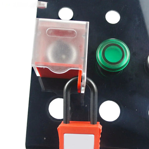 Emergency Stop Button Lockout Cover For Push Button Switches No Nonsense Guard Made From Polycarbonate Engineering Plastic Durable Shield To Prevent Accidental Operation Compatible With Various Switches In Industrial Settings mounted on black panel.
