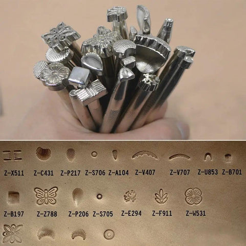 Assorted metal stamps for 20 Piece Leather Carving And Stamping Tools Set For DIY Saddle Making With pattern impressions.