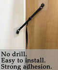 Two Pack Adjustable TV Safety Straps No Drill Adhesive Anti Tip Furniture Anchors for baby proofing, shown installed on cabinet.