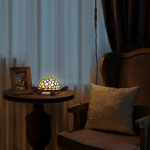 Blue Glass Turtle Night Light With Handcrafted Inlays And Warm 2700K LED Glow For Home Or Office Decor on a side table