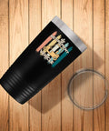 My Retirement Vehicle Golf Cart Tumbler 20 Oz Black Stainless Steel with logo on wooden surface.