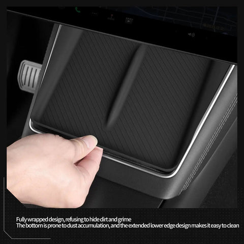 Hand touching Tesla Model Y Juniper Center Console Qi Wireless Charging Pad With Non Slip Silicone Mat in black inside car