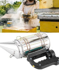 Heavy Duty Stainless Steel Electric Beekeeping Smoker With Heat Shield for hive inspections, shown with beekeeper.