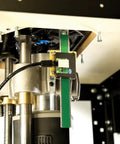 Close-up of a Digital Thickness Gauge With Fraction Display And Remote LCD Readout for planers, attached under a sander.