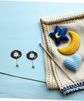Crocheted star and moon with crochet hook on crochet mat with 6 Piece Sl68 Quartz Watch Movement Replacement Kit For Repair Pros