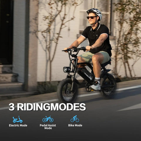 Man riding Compact 16 Inch Fat Tire Electric Bike For Teens And Adults With 500W Motor 36V 12.8Ah on urban road