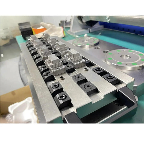Top Tier 2 Pack Multi Station CNC Machining Center Seagull Clamp Fixture With Super Tough Tiger Pliers And M6 To M12 Unidirectional Mini Table For Heavy Duty Jobs, close-up of fixture with clamps.