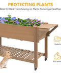 Mobile Raised Garden Bed With Lockable Wheels, Elevated Wood Planter With Storage Shelf And Protective Liner, 55.5 x 24 x 32 Inches, with flowers.
