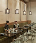 Three Pack Black Pendant Lights For Kitchen Island Industrial Lantern Style Hanging Lamps in dining space with clear glass shades