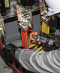 Pro Grade AC DC Digital Clamp Meter With Auto Ranging 400 Amp Capacity Non Contact Voltage Tester in use by electrician