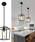 Top Shelf 2 Pack Modern Farmhouse Pendant Lights For Kitchen Island Featuring Matte Black Iron Cage And Clear Glass Shade hanging above a kitchen island.