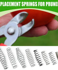 16 Piece Gardening Spring Assortment Kit For Pruners And Shears Metal Precision Replacement Coils displayed with pruner