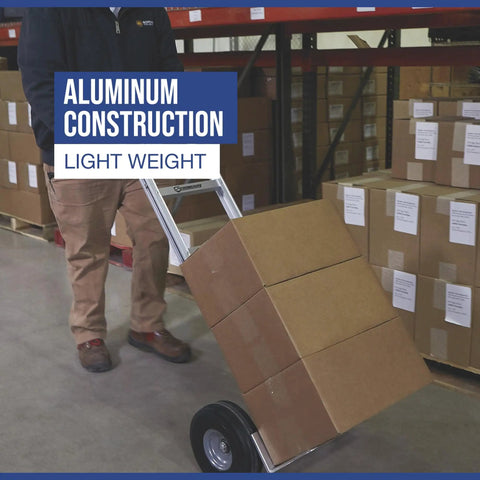 Person using Aluminum Hand Truck With 600 Pound Capacity For Moving Boxes And Crates, Continuous Flow Handle in warehouse