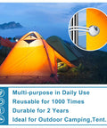 Camping tents secured with Six Inch White Ball Bungee Cords 50 Pcs Heavy Duty Tarp Ball Bungee Ties Canopy Tie Downs for outdoors.