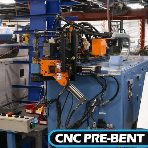 CNC Pre-Bent machine with orange components and hydraulic lines for metal bending applications.