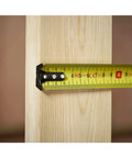 Tape Measure With Blade Armor Built Tough 8 M Metric, Shock Resistant, Mylar Coating, measuring a wooden beam.