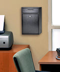 Rugged High Security Steel Locking Wall Mounted Mailbox Drop Box With Anti Pry Latch in an office setting, black finish