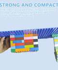 Four 10x10 Classic Building Brick Baseplates Set In Green Black Blue And Dark Grey For Totally Creative City Castle And Vehicle Builds, A Universal Play Surface To Expand Any Brick World And Boost Multiplayer Fun. blue brick baseplate held in hand, showing firm ABS build