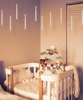 Floating LED Taper Candle Set 10.8 Inches With Remote Wand Flameless Battery Operated Window Candles hanging in a nursery