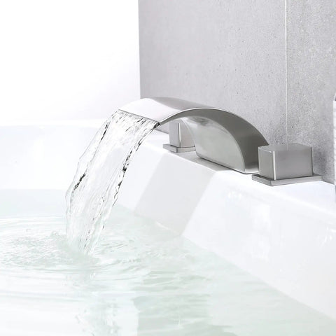 Roman Tub Faucet Brushed Nickel 2 Handle Widespread Bath Waterfall Deck Mount Tub Filler With Valve pouring water into bathtub