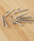 M5 Button Head Socket Cap Screws Set 50 Pcs Stainless Steel 304 Pro Grade Fully Threaded With Nuts on wooden surface