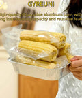 Person holding 30 Pack Disposable Aluminum Foil 8x8 Inch Square Pans With Lids Parchment Paper Sheets And Stickers Kit, used for corn storage