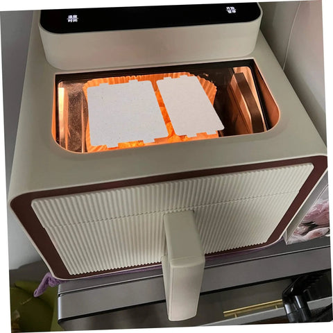 Microwave Filter Replacement Mica Flakes Insulation Sheets in use inside microwave oven, showing heat resistant material
