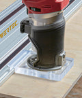 Heavy Duty Guide Rail Adapter For Fixed Base Trim Routers Locks Snug To DeWalt Makita Or Milwaukee Tracks attached to a router.