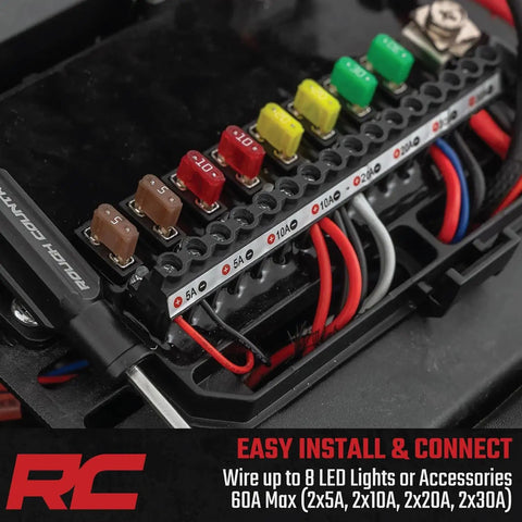 Close-up of Eight Gang Bluetooth RGB Backlit Switch Panel and Relay System showing wiring connections for trucks and UTVs