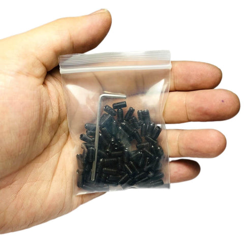 Hand holding a bag with 100 Pcs M4 X 8mm Stainless Steel Hex Socket Set Screws Grub Screws With Beefy Allen Head Built To Last