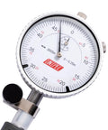 Close-up of a 2 to 6 inch dial bore gauge with 0.0005 inch graduation, showing detailed measurement dial and gauge stem