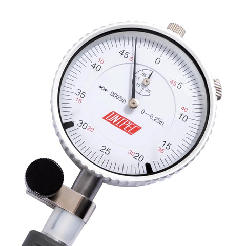 Close-up of a 2 to 6 inch dial bore gauge with 0.0005 inch graduation, showing detailed measurement dial and gauge stem