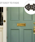 Front view of green door with decorative Butterfly Hinges 10 Pack Zinc Alloy for Wooden Boxes and Small Cabinets by ULDIGI inset