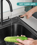 Person using Garbage Disposal Air Switch Kit With Sink Top Push Button For Waste Disposer Up To 2HP Safe With Wet Hands UL Certified Power Module Easy To Install Black Finish Quiet Reliable Kitchen Upgrade