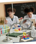 Electromagnetic Science Kit For School Labs With Coil on classroom desk with students and lab equipment in the background
