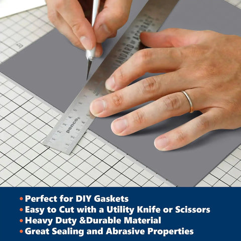 Person cutting Gray Silicone Rubber Sheet 12 Inch Wide One Eighth Inch Thick 12 Inch Long High Temperature Resistant Mat with ruler