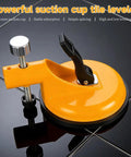 Adjustable Vacuum Suction Seam Clamp For Floor Gap Fixing And Tile Alignment, yellow tool with heavy-duty rubber cups on tile surface