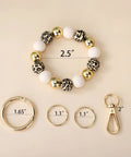 Dope Elastic Beaded Wristlet Keychain Bracelet for Women with Silicone Beads Detachable Spring Clip Gold Beige Leopard Pattern Versatile Key Ring Holder for Everyday Carry and Quick Access with size dimensions labeled.
