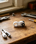 Dead Quiet Curtain Pulley Rollers With Hidden Rail Track And Dual Wheel Design For Heavy Drapes and Zero Hassle ceiling mount hardware on wooden workbench.