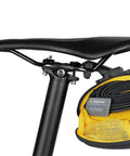 Open Sidekick Wedge Pack With Fixer F25 Small SemiRigid Weather Resistant Bike Saddle Bag showing internal mesh pockets with tools