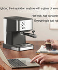 Next Level Counter Slick Semi Automatic Espresso Machine Featuring Precision Temperature Control And Pro Milk Frothing Steam Wand Pumps Out Crisp Brews For Your Daily Grind on a wooden table with a laptop.
