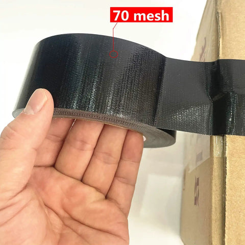 Hand holding Five Pack Black Heavy Duty Duct Tape 2 Inches By 30 Yards Waterproof Tear By Hand All Weather Residue Free Strong And Flexible