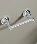 Vale Chrome Double Post Pivoting Toilet Paper Holder Wall Mounted Tissue Dispenser With Easy Roll Change, shown on wall