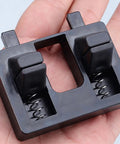 Heavy Duty Wire Welding Holder Clamp With High Temp Resistant ABS Base to grip loose cables, shown in hand, compact design.
