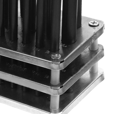 Pro Grade 28 Piece Cylindrical Punch Set With Positioning Base stands stacked in a metalwork setup