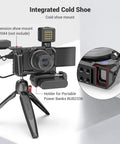 Formfitting Camera Cage For Sony ZV-1 II ZV-1F ZV-1 with silicone gel grip and cold shoe mount on tripod with power bank holder.