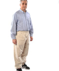 Man wearing beekeeping pants for full lower body protection from bees and wasps heavy duty beekeeper workwear with reinforced knees.